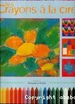 Je dessine avec les crayons à la cire